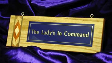 Oak inlaid plaque with metal engraved plate 